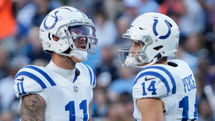 Indianapolis Colts wide receiver Michael Pittman Jr. (11) and Indianapolis Colts wide receiver Alec Pierce (14) react after a play Sunday, Nov. 5, 2023, during a game against the Carolina Panthers at Bank of America Stadium in Charlotte.