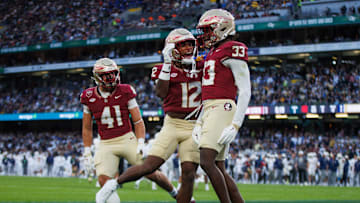 Aug 24, 2024; Dublin, IRL; Florida State University defensive back Edwin Joseph celebrates a tackle against Georgia Tech with defensive back Conrad Hussey at Aviva Stadium. Mandatory Credit: Tom Maher/INPHO via Imagn Images