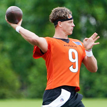 Cincinnati Bengals quarterback Joe Burrow (9) runs through drills during practice, Tuesday, May 13, 2025, at Kettering Health Practice Fields in Downtown Cincinnati.