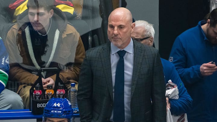 Feb 4, 2025; Vancouver, British Columbia, CAN; Vancouver Canucks head coach Rick Tocchet on the bench against the Colorado Avalanche in the first period at Rogers Arena. Mandatory Credit: Bob Frid-Imagn Images