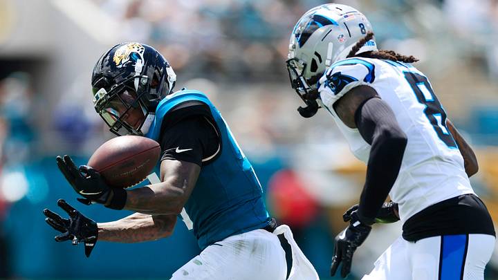 Jacksonville Jaguars wide receiver Dyami Brown (5) can’t haul in a reception against Carolina Panthers cornerback Jaycee Horn (8) during the second quarter of an NFL football matchup at EverBank Stadium, Sunday, Sept. 7, 2025 in Jacksonville, Fla. 