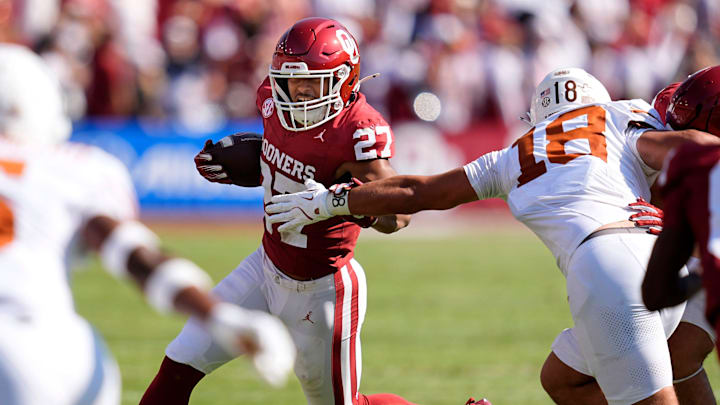 Oklahoma Sooners running back Gavin Sawchuk (27) rushes in the first half of the Red River Rivalry college football game between the University of Oklahoma Sooners and the Texas Longhorn at the Cotton Bowl Stadium in Dallas, Texas, Saturday, Oct., 12, 2024.
