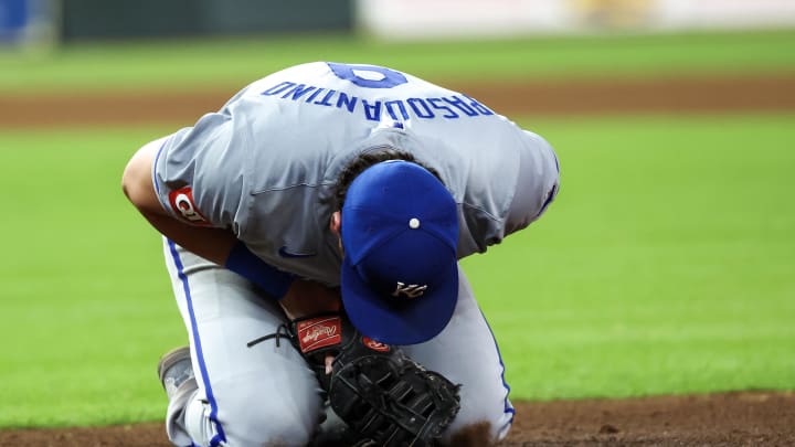 Kansas City Royals first baseman Vinnie Pasquantino (9 reacts after a collision with Houston Astros catcher Yainer Diaz (21) in the eighth inning at Minute Maid Park. Kansas City Royals first baseman Vinnie Pasquantino (9) had to leave the game on Aug 29.