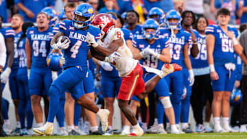 Houston defensive back Kentrell Webb (8) makes a tackle during a 2024 game against Kansas