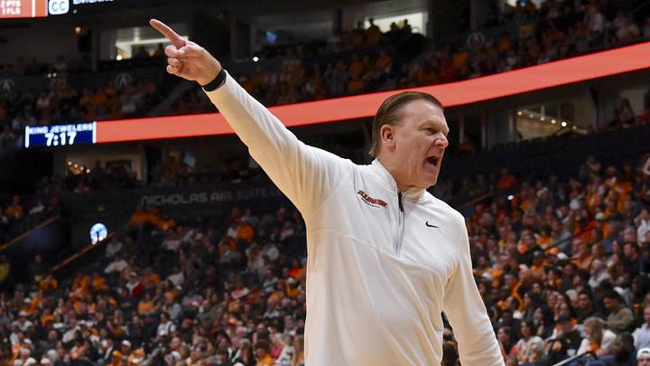 Dec 6, 2025; Nashville, Tennessee, USA;  Illinois Fighting Illini head coach Brad Underwood yells to his bench against the Tennessee Volunteers during the first half at Bridgestone Arena. Mandatory Credit: Steve Roberts-Imagn Images