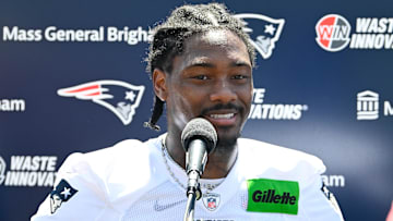 Jul 23, 2025; Foxborough, MA, USA; New England Patriots wide receiver Stefon Diggs (8) addresses the media after practice during day one of training camp at Gillette Stadium. Mandatory Credit: Eric Canha-Imagn Images