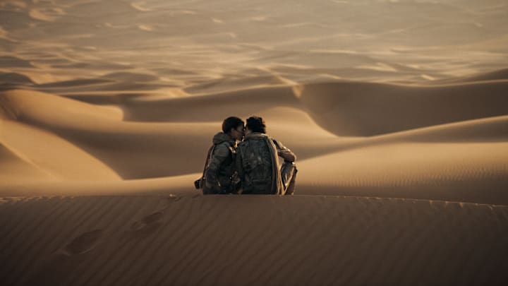 (L-r) ZENDAYA as Chani and TIMOTHÉE CHALAMET as Paul Atreides. in Warner Bros. Pictures and Legendary Pictures’ action adventure “DUNE: PART TWO,” a Warner Bros. Pictures release. Photo Credit: Courtesy Warner Bros. Pictures © 2023 Warner Bros. Entertainment Inc. All Rights Reserved.