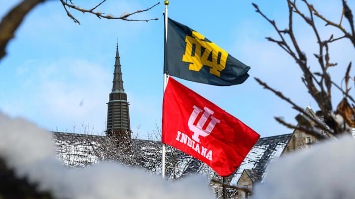 Dec 20, 2024; Notre Dame, Indiana, USA; Notre Dame and Indiana University flags fly over a tailgater on the Notre Dame campus before a College Football Playoff first round game between the Notre Dame Fighting Irish and the Indiana Hoosiers at Notre Dame Stadium. Dec 20, 2024; Notre Dame, Indiana, USA; Notre Dame and Indiana University flags fly over a tailgater on the Notre Dame campus before a College Football Playoff first round game between the Notre Dame Fighting Irish and the Indiana Hoosiers at Notre Dame Stadium.