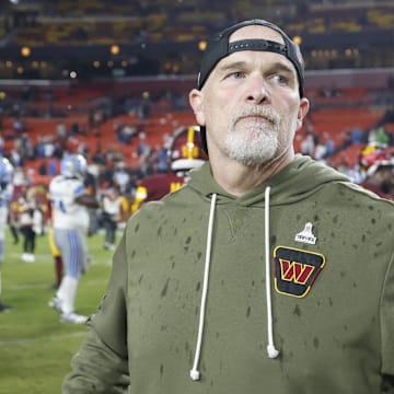 Nov 9, 2025; Landover, Maryland, USA; Washington Commanders head coach Dan Quinn stands on the field following a loss to the Detroit Lions at Northwest Stadium. Mandatory Credit: Peter Casey-Imagn Images