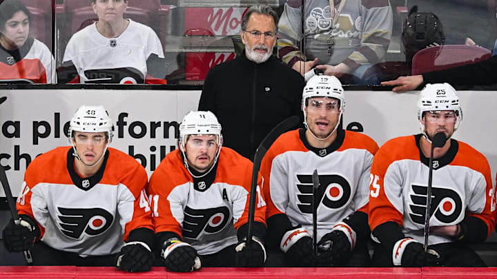 Mar 28, 2024; Montreal, Quebec, CAN; Philadelphia Flyers head coach John Tortorella looks towards the play against the Montreal Canadiens during the first period at Bell Centre. Mandatory Credit: David Kirouac-Imagn Images Mar 28, 2024; Montreal, Quebec, CAN; Philadelphia Flyers head coach John Tortorella looks towards the play against the Montreal Canadiens during the first period at Bell Centre. Mandatory Credit: David Kirouac-Imagn Images