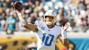 Nov 16, 2025; Jacksonville, Florida, USA; Los Angeles Chargers quarterback Justin Herbert (10) passes against the Jacksonville Jaguars during the first quarter at EverBank Stadium. Mandatory Credit: Morgan Tencza-Imagn Images