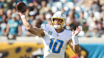 Nov 16, 2025; Jacksonville, Florida, USA; Los Angeles Chargers quarterback Justin Herbert (10) passes against the Jacksonville Jaguars during the first quarter at EverBank Stadium. Mandatory Credit: Morgan Tencza-Imagn Images