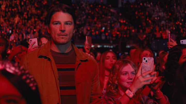 Josh Hartnett as Cooper attends concert