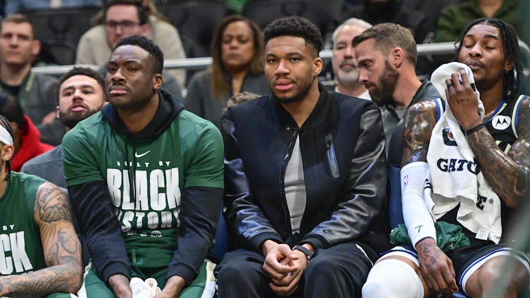 Feb 22, 2026; Milwaukee, Wisconsin, USA; Milwaukee Bucks forward Giannis Antetokounmpo (34) looks on from the bench in the second quarter against the Toronto Raptors as he recovers from a calf injury at Fiserv Forum. Mandatory Credit: Benny Sieu-Imagn Images