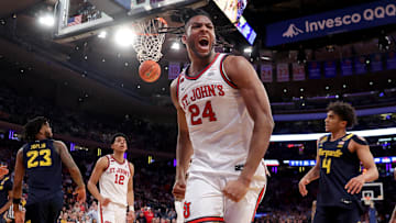 Mar 14, 2025; New York, NY, USA; St. John's basketball forward Zuby Ejiofor (24) reacts after a basket and a foul during the second half against the Marquette Golden Eagles at Madison Square Garden.