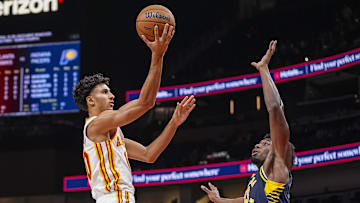Oct 8, 2024; Atlanta, Georgia, USA; Atlanta Hawks forward Zaccharie Risacher (10) drives to the basket against Indiana Pacers center James Wiseman (13) during the first half at State Farm Arena. Mandatory Credit: Dale Zanine-Imagn Images