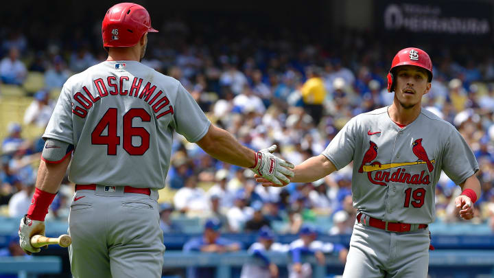 Apr 30, 2023; Los Angeles, California, USA; St. Louis Cardinals shortstop Tommy Edman (19) is greeted by designated hitter Paul Goldschmidt (46) after scoring a run against the Los Angeles Dodgers during the fifth inning at Dodger Stadium. Mandatory Credit: Gary A. Vasquez-USA TODAY Sports