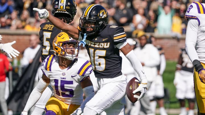 Oct 7, 2023; Columbia, Missouri, USA; Missouri Tigers wide receiver Daniel Blood (16) celebrates after a play against the LSU Tigers during the first half at Faurot Field at Memorial Stadium. Mandatory Credit: Denny Medley-USA TODAY Sports