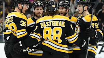 Apr 10, 2025; Boston, Massachusetts, USA; Boston Bruins right wing David Pastrnak (88) celebrates his goal with his teammates during the first period against the Chicago Blackhawks at TD Garden. Mandatory Credit: Bob DeChiara-Imagn Images