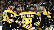 Apr 10, 2025; Boston, Massachusetts, USA; Boston Bruins right wing David Pastrnak (88) celebrates his goal with his teammates during the first period against the Chicago Blackhawks at TD Garden. Mandatory Credit: Bob DeChiara-Imagn Images