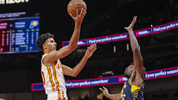 Oct 8, 2024; Atlanta, Georgia, USA; Atlanta Hawks forward Zaccharie Risacher (10) drives to the basket against Indiana Pacers center James Wiseman (13) during the first half at State Farm Arena. Mandatory Credit: Dale Zanine-Imagn Images
