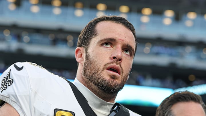 Dec 8, 2024; East Rutherford, New Jersey, USA; New Orleans Saints quarterback Derek Carr (4) walks off the field after field after an injury during the fourth quarter at MetLife Stadium. Mandatory Credit: Vincent Carchietta-Imagn Images