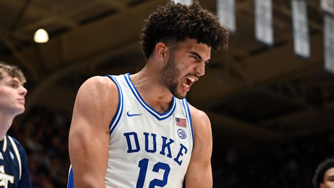 Dec 31, 2025; Durham, North Carolina, USA; Duke Blue Devils forward Cameron Boozer (12) reacts after scoring during the second half against the Georgia Tech Yellow Jackets at Cameron Indoor Stadium.   The Blue Devils won 85-79. 