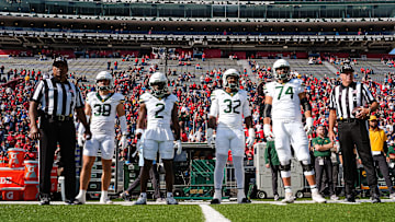 Jacob Redding, Kole Wilson, Emar'rion Winston, and Kaden Sieracki line up as Captains in Tucson. 