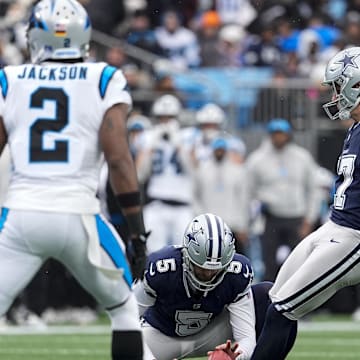 Dec 15, 2024; Charlotte, North Carolina, USA; Dallas Cowboys place kicker Brandon Aubrey (17) kicks a field goal against the Carolina Panthers during the second half at Bank of America Stadium. Mandatory Credit: Jim Dedmon-Imagn Images