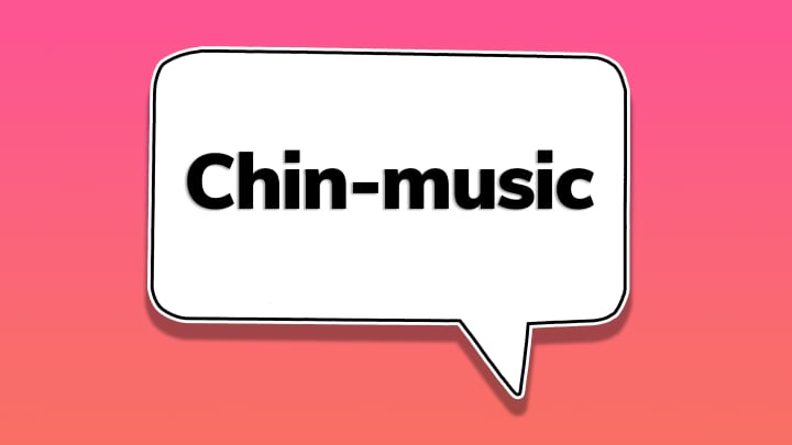 The word ‘chin-music’ in a speech bubble