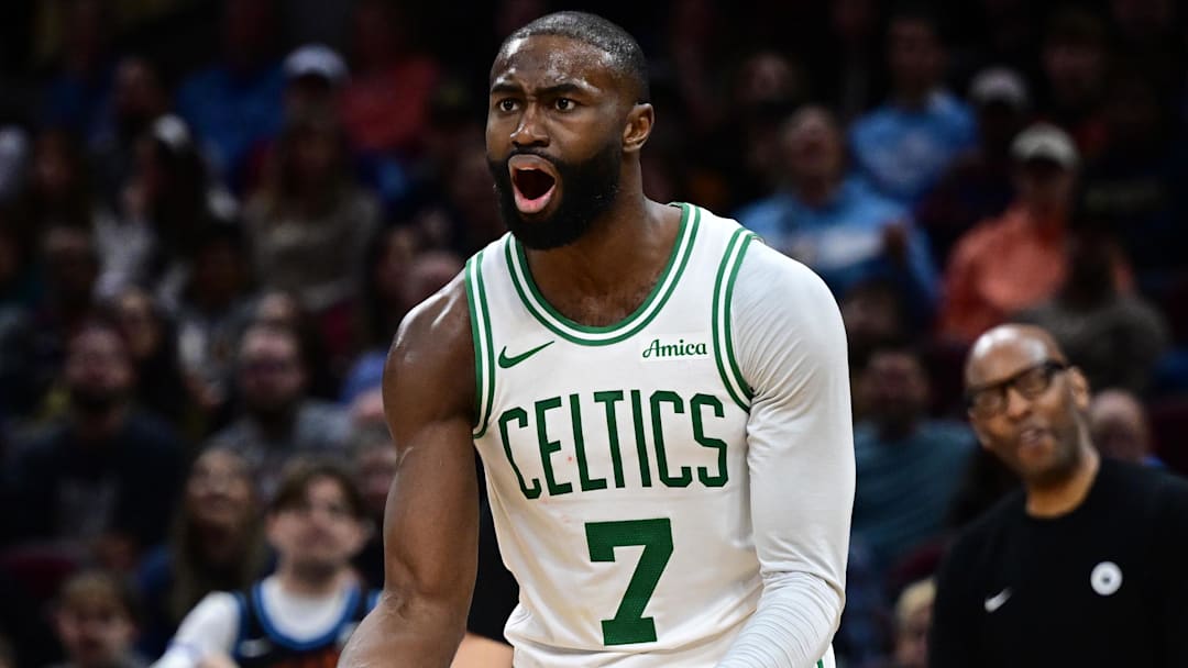 Nov 30, 2025; Cleveland, Ohio, USA; Boston Celtics guard Jaylen Brown (7) reacts after fouling Cleveland Cavaliers guard Donovan Mitchell (45) during the second half at Rocket Arena. Mandatory Credit: David Dermer-Imagn Images