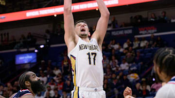 Mar 11, 2025; New Orleans, Louisiana, USA; New Orleans Pelicans center Karlo Matkovic (17) dunks against the Los Angeles Clippers during the first half at Smoothie King Center. Mandatory Credit: Matthew Hinton-Imagn Images
