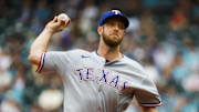 Aug 2, 2025; Seattle, Washington, USA; Texas Rangers starting pitcher Merrill Kelly (23) throws against the Seattle Mariners during the first inning at T-Mobile Park.