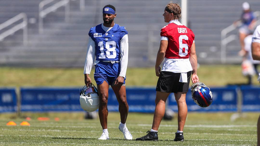 White Sulphur Springs, WV, USA; New York Giants wide receiver Darius Slayton (18) and quarterback Jaxson Dart connected on a touchdown pass on Friday that almost didn't happen. White Sulphur Springs, WV, USA; New York Giants wide receiver Darius Slayton (18) and quarterback Jaxson Dart connected on a touchdown pass on Friday that almost didn't happen.