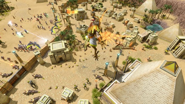 Age of Mythology: Retold screenshot of a battle near some pyramids.