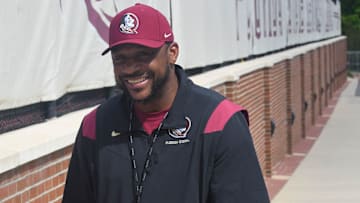 Florida State football and coaches players arrive for the fifth FSU spring football practice of the
