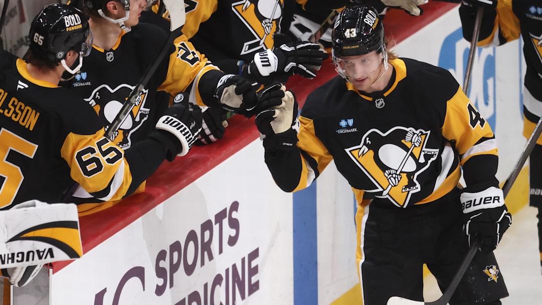 Apr 17, 2025; Pittsburgh, Pennsylvania, USA;  Pittsburgh Penguins left wing Danton Heinen (43) celebrates his goal with thePenguins bench against the Washington Capitals during the third period at PPG Paints Arena. Mandatory Credit: Charles LeClaire-Imagn Images