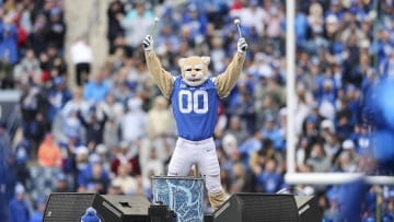 Cosmo the Brigham Young Cougars mascot hit drums between the third and fourth quarter in the game against the Oklahoma Sooners at LaVell Edwards Stadium. 