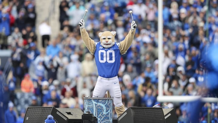 Cosmo the Brigham Young Cougars mascot hit drums between the third and fourth quarter in the game against the Oklahoma Sooners at LaVell Edwards Stadium. 