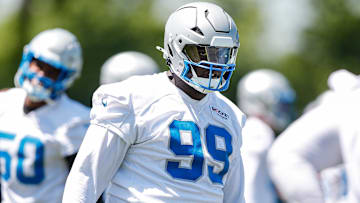Detroit Lions defensive tackle Brodric Martin (99) practices during OTAs at Detroit Lions headquarters and practice facility in Allen Park.