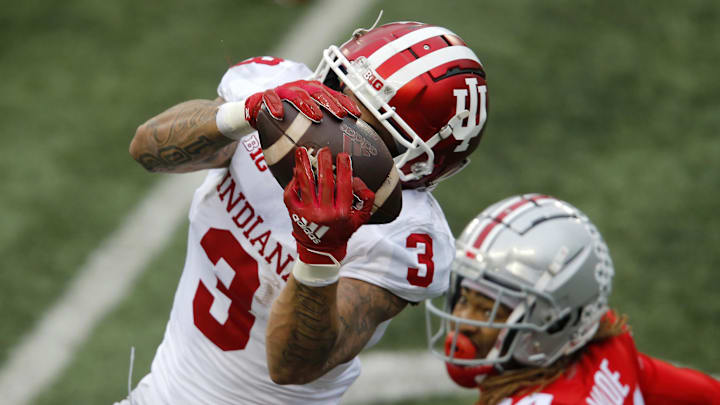 Indiana Hoosiers wide receiver Ty Fryfogle (3)makes the catch over Ohio State Buckeyes cornerback Shaun Wade (24) and eventually scored on the play during the third quarter at Ohio Stadium. Indiana Hoosiers wide receiver Ty Fryfogle (3)makes the catch over Ohio State Buckeyes cornerback Shaun Wade (24) and eventually scored on the play during the third quarter at Ohio Stadium.