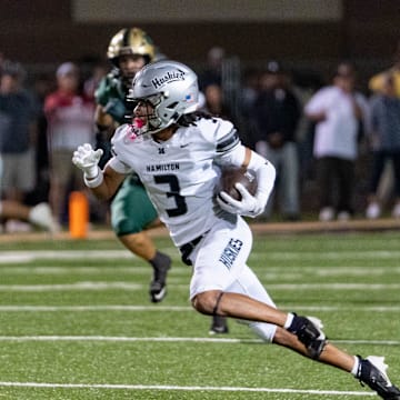 Hamilton Huskies runs with the ball against the Basha Bears during a game at Basha High School in Chandler on Oct. 24, 2025.
