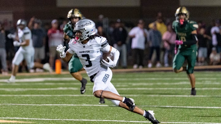 Hamilton Huskies runs with the ball against the Basha Bears during a game at Basha High School in Chandler on Oct. 24, 2025.
