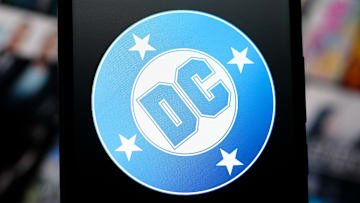 In this photo illustration, the DC Comics logo is seen...