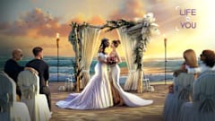 Life by You artwork showing two women in wedding dresses kissing.