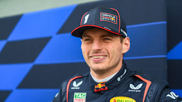 Max Verstappen of the Netherlands and Oracle Red Bull Racing looks on in the Paddock during the Oracle Red Bull Racing Filming Day at Bahrain International Circuit on February 25, 2025 in Bahrain, Bahrain.