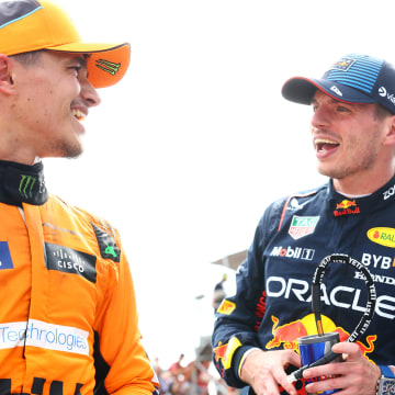 Race winner Max Verstappen of the Netherlands and Oracle Red Bull Racing and Second placed Lando Norris of Great Britain and McLaren talk in parc ferme during the F1 Grand Prix of Emilia-Romagna at Autodromo Enzo e Dino Ferrari Circuit on May 19, 2024 in Imola, Italy. 