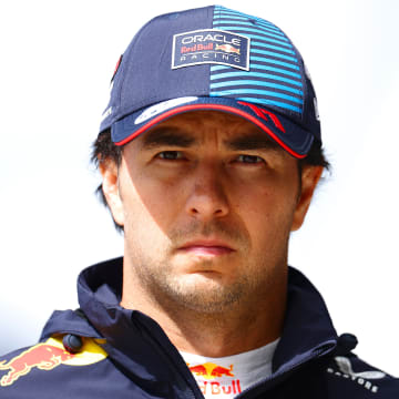 19th placed qualifier Sergio Perez of Mexico and Oracle Red Bull Racing walks in the Pitlane during qualifying ahead of the F1 Grand Prix of Great Britain at Silverstone Circuit on July 06, 2024 in Northampton, England.