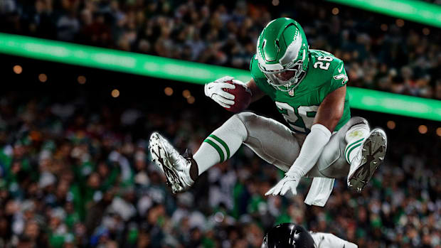 A football player being lifted into the air in Madden NFL 26.