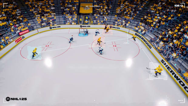 NHL 25's vision control, featuring a zoomed out camera covering half of an ice arena and showing multiple players at once